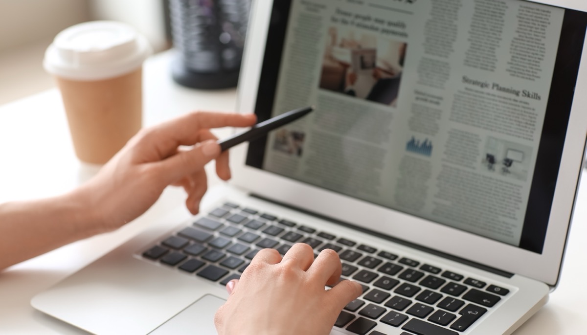 An online newspaper open on a laptop screen